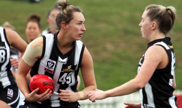 180916_alexander620.png Sophie Alexander looks to send Collingwood further afield during its loss to Geelong in the VFL Women's Preliminary Final. Photo: Shane Barrie. - Collingwood,Collingwood Magpies